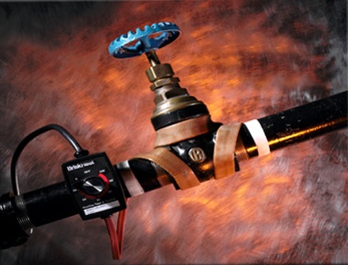 Wraps around pipes and valves to prevent freezing in outdoor and lab environments.